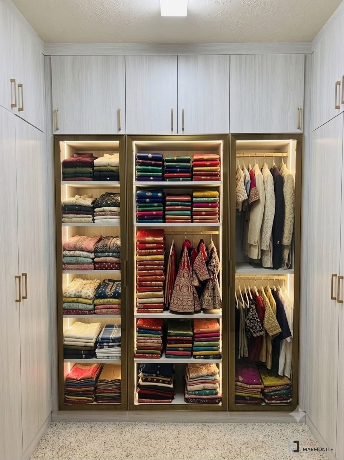 Custom walk-in closet with built-in shelving and lighting, installed by Acue Marmonite